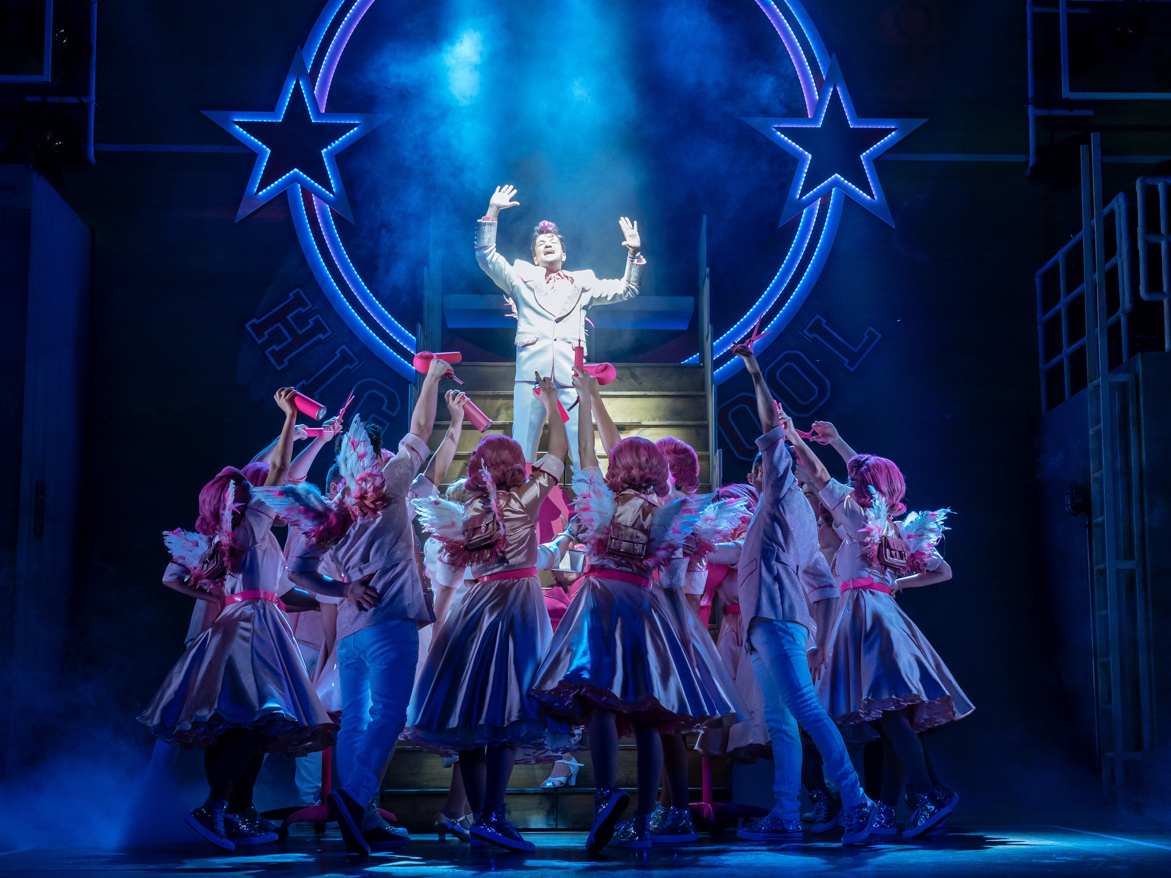 Peter Andre as Teen Angel and the cast of the 2019 UK and Ireland tour of GREASE, credit Manuel Harlan.jpg