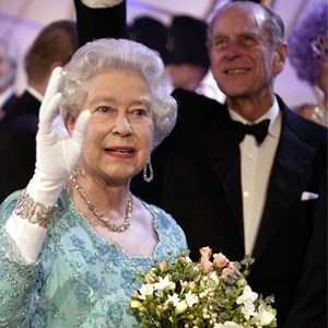 The Queen waves on the Festival Theatre Stage